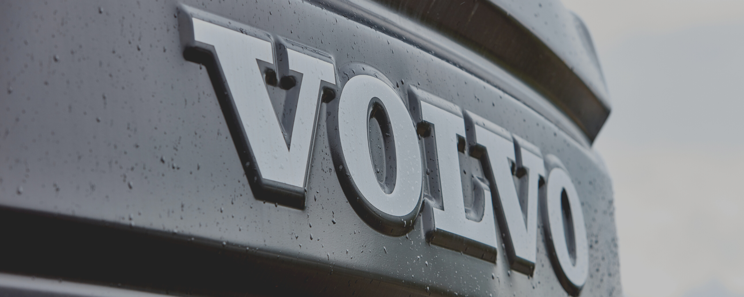 volvo logo on front of volvo truck